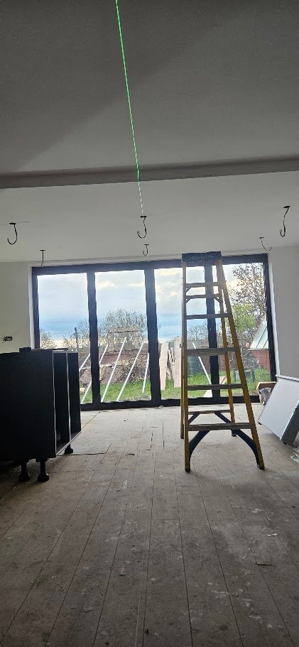 Second-fix electrical installation underway during the full rewire of this bungalow-to-two-storey conversion in Boston Spa, Leeds.