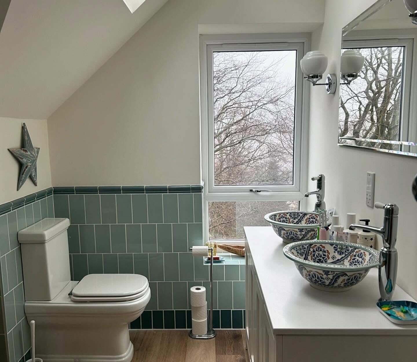 Bathroom lighting installed as part of a full house rewire and renovation in Yeadon, Leeds.