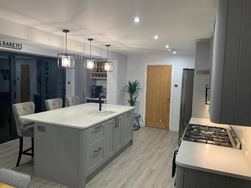 Pendant and downlighting installed in a kitchen and dining extension, Wakefield.