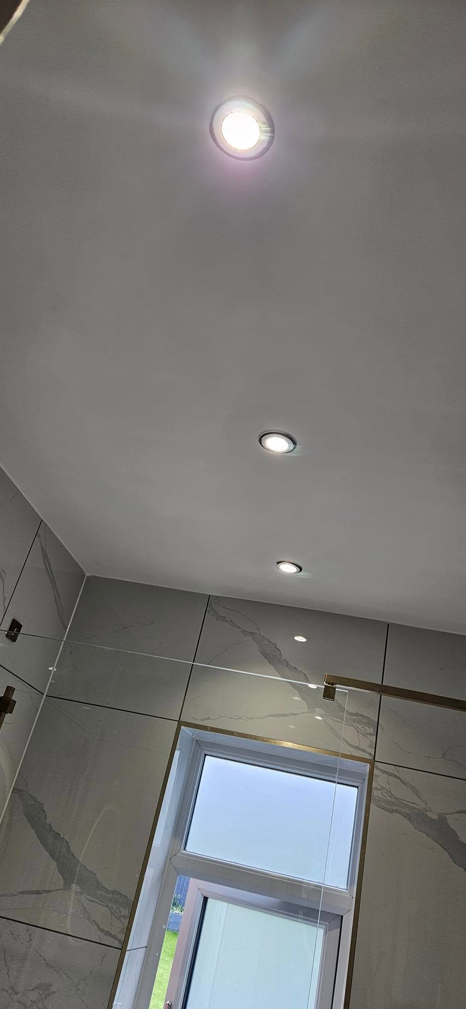 Recessed downlights installed in a loft conversion bathroom ceiling, Leeds.
