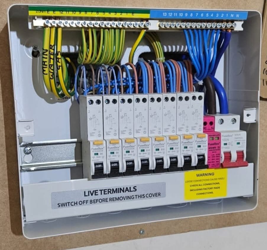 Open consumer unit showing internal wiring and RCBOs, Leeds