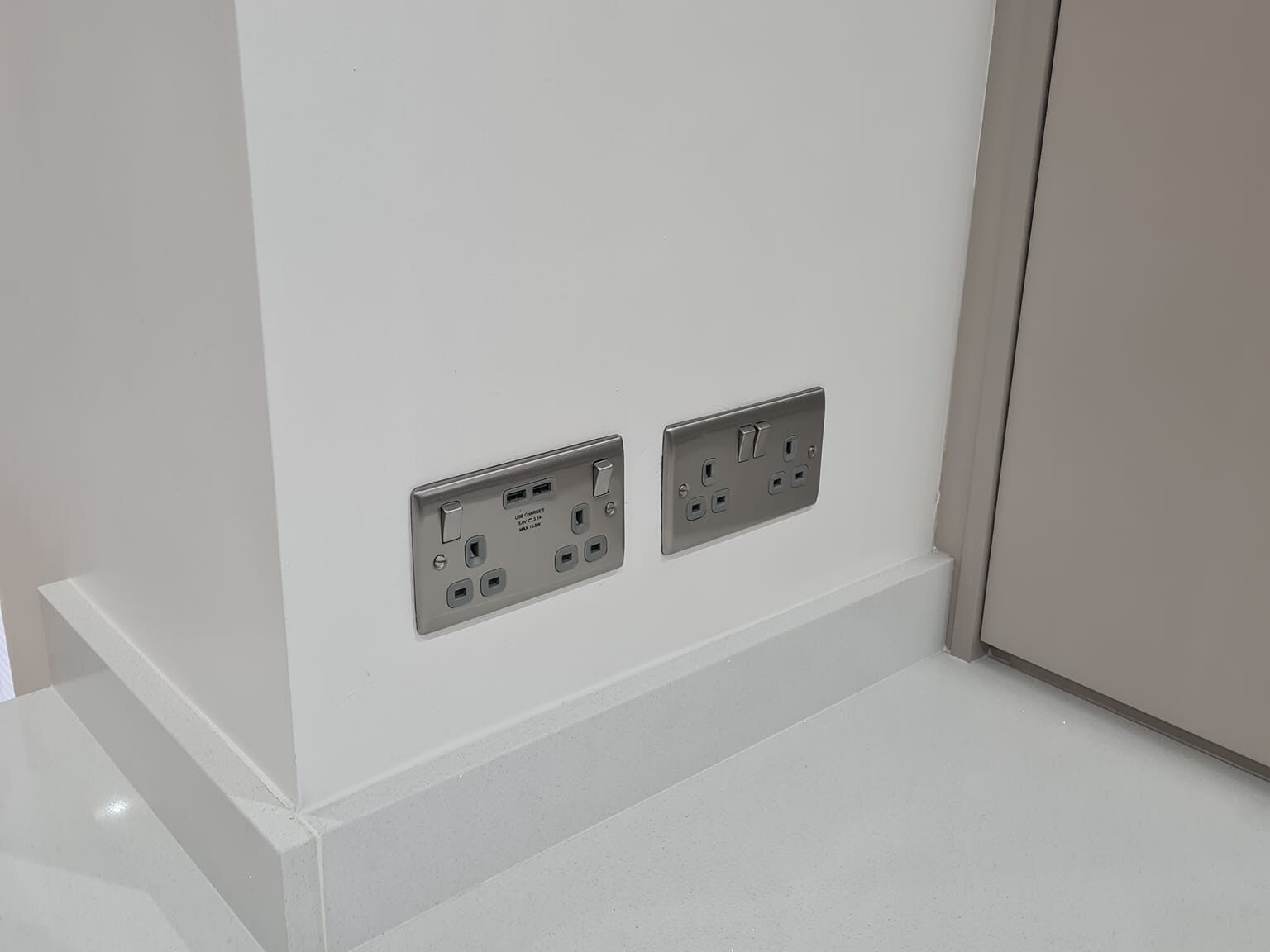 House Rewires Leeds - Full & Part modern double sockes installed during house rewire in leeds